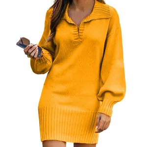 Close-up of yellow knitted sweater dress showing lapel and lantern sleeve details