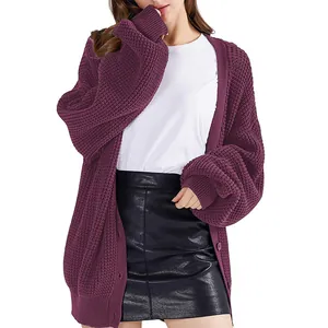 Detail view of purple chunky knit oversized cardigan with buttons on model