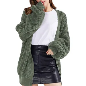 Oversized sage green knitted cardigan with single-breasted buttons and ribbed cuffs