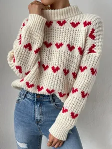 Close-up of chunky knit heart pattern sweater for casual women's autumn style