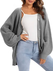 Stylish women's oversized chunky knit grey cardigan with button-down front design