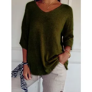 Olive green oversized knit sweater with V-neck and 3/4 sleeves, casual style detail