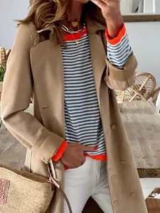 Trendy striped knit sweater with vibrant orange contrast trim and drop-shoulder sleeves design