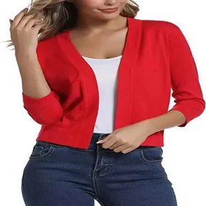 Detail view of stylish women's red short-length knit cardigan for spring and autumn wear