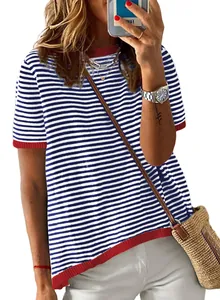 Detail of striped short sleeve knit top with red ribbed cuffs and color-block design