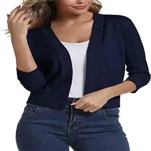 Detailed view of women's elegant navy blue cropped knit cardigan with open front design