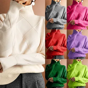 Multi-color turtle-neck sweater with diamond knit pattern details.