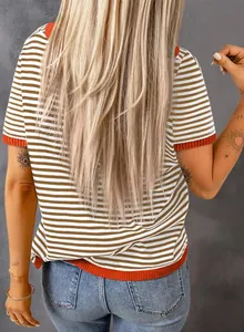 Back view of women's striped drop shoulder short sleeve knit top with orange trim details.