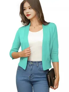 Elegant mint green short knit cardigan for women, perfect for spring and autumn layering.