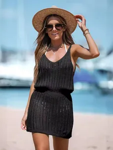 Chic black sleeveless crochet knit beach cover-up dress with hollow-out knit details