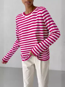 Classic pink and white striped crew neck knit sweater for women, vintage style.