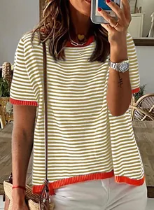Close-up detail of a striped short sleeve knit top with vibrant orange contrast trim