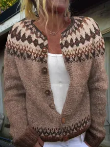 Detail of women's vintage brown knit cardigan with geometric pattern and wooden buttons.