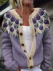Close-up of women's lavender knit cardigan with tulip floral pattern and buttons