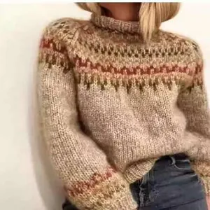 Close-up detail of women's chunky knit high-neck sweater featuring retro fair isle patterns