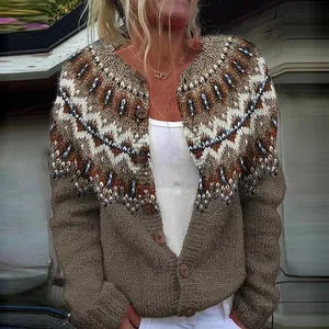 Detail shot of women's knitted cardigan featuring geometric color-block pattern and buttons