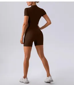 Back view of brown slim fit short sleeve yoga bodysuit with half zipper detail