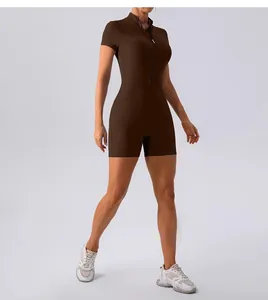 Detailed view of women's short sleeve yoga jumpsuit with half zipper and slim fit design