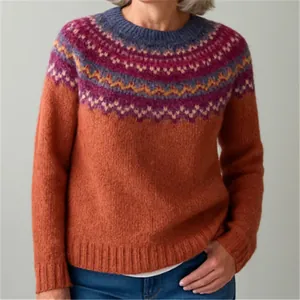 Vista dettagliata del maglione in maglia vintage da donna con motivo Fair Isle in arancione