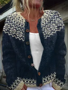 Detail of navy blue women's cardigan with Nordic fair-isle pattern and wood buttons
