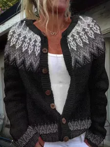 Close-up of black knit cardigan with grey Fair Isle pattern and wooden buttons