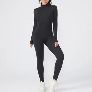 Detailed view of women's black long sleeve zippered one-piece yoga jumpsuit for fitness