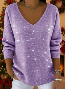 Close-up of elegant purple V-neck long sleeve top with shimmering glitter texture for Christmas