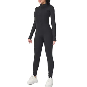 Zwarte dames yoga jumpsuit met lange mouwen en fitness bodysuit voor wintersporten dragen