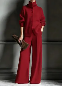 Elegant red knit set featuring high neck cardigan and wide leg trousers for winter
