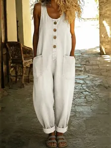 Women's vintage sleeveless wide-leg denim-style jumpsuit with buttons and pockets.
