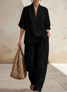 Elegant black V-neck short sleeve top and wide-leg trousers two-piece set for women