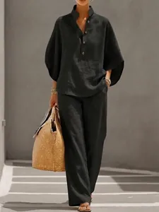 Ensemble élégant en lin noir avec chemise boutonnée et pantalon large fluide