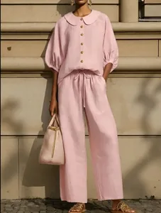 Detailed look at the pink cotton linen lantern sleeve blouse and matching drawstring pants