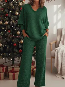 Festive green sparkly two-piece set featuring V-neck sweatshirt and matching wide-leg pants