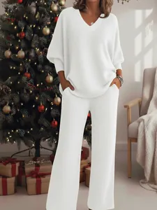 Elegant white glitter sweatshirt and wide-leg pants set for festive holiday lounging