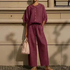 Elegant plum purple cotton linen set with lantern sleeve shirt and wide-leg trousers