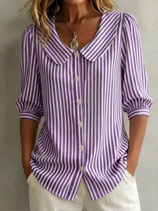 Detail of purple and white striped cotton linen blouse with Peter Pan collar and puff sleeves