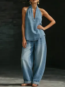 Full view of women's retro denim set featuring a halter V-neck top and wide-leg pants.
