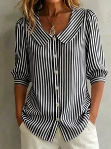 Stylish black and white striped blouse featuring a Peter Pan collar and puff sleeves