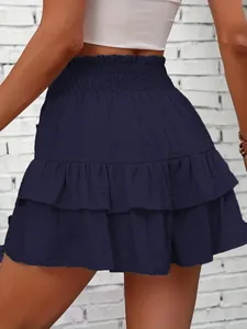 Back view of navy blue tiered ruffled high-waisted skort showing fabric texture detail