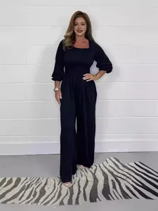 Elegant black square neck smocked waist wide leg jumpsuit for women summer casual wear