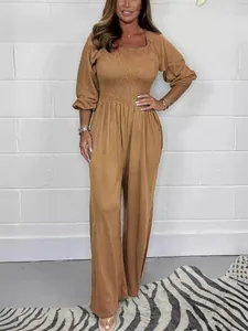 Summer casual solid color wide-leg jumpsuit with smocked bodice and puff sleeves