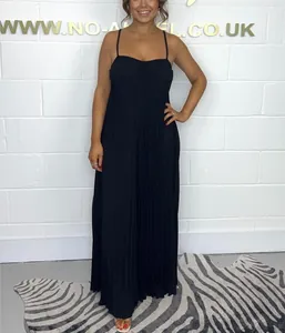 Elegant black pleated spaghetti strap jumpsuit for women featuring a wide-leg cut and flowy fit