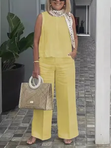 Stylish women's yellow two-piece set with sleeveless top and cotton linen wide-leg pants