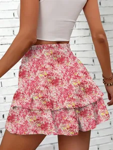 Back view of pink floral tiered mini skort for women with elastic waist detail