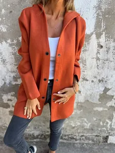 Detail view of a casual burnt orange hooded jacket for women with single-breasted buttons