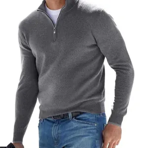 Detail view of men's grey quarter-zip long sleeve sweater with soft knit texture.