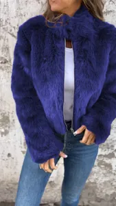Close-up of a stylish deep blue faux fur jacket with high collar and front zipper.