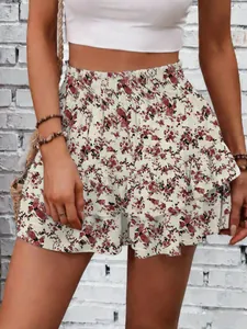 Detail shot of a stylish summer floral mini skort with ruffled hem and high waist