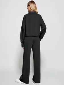 Back view of a black two-piece casual set with a sweatshirt and wide-leg trousers